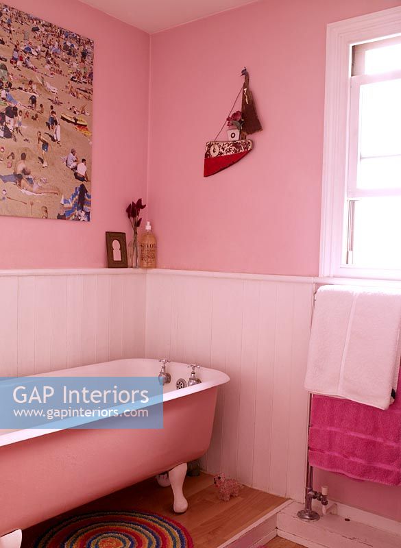 Pink bathroom with freestanding bath