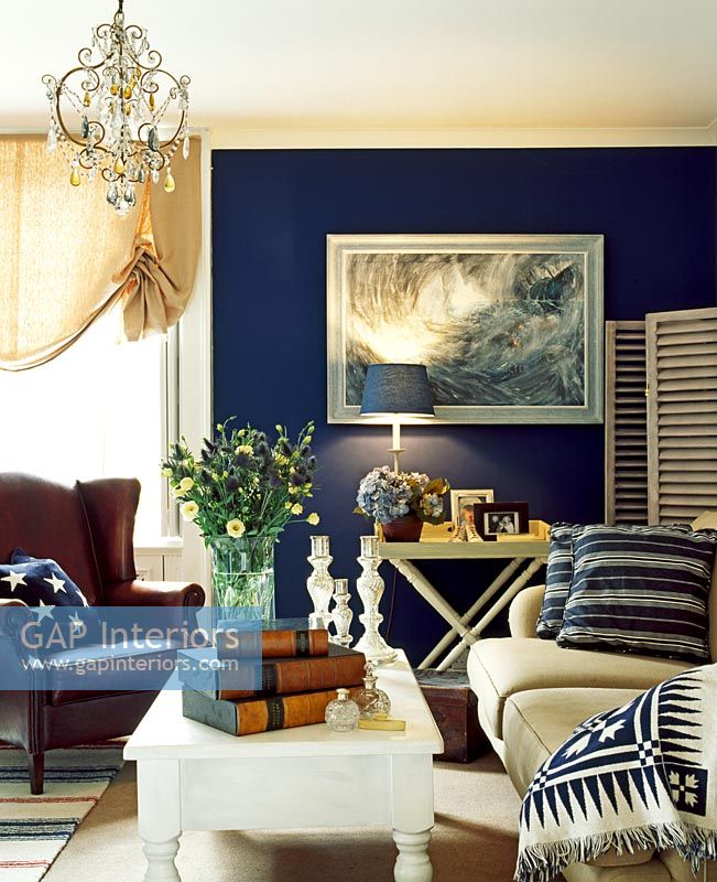 Classic living room with blue painted wall