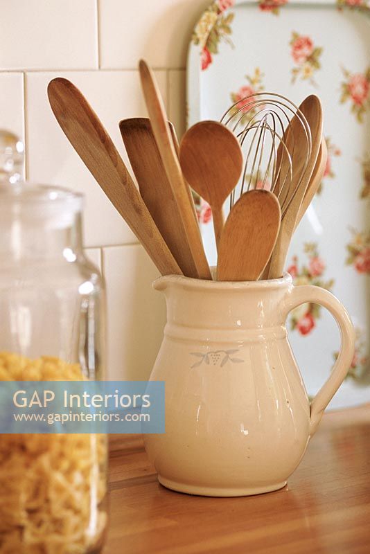 View of wooden spoons in jug