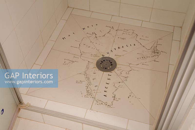 Shower with map on tiles