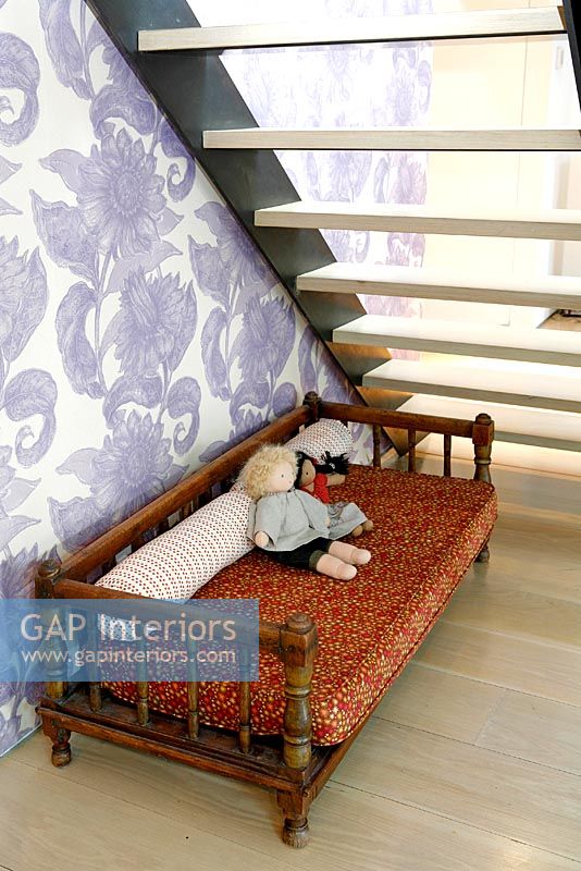 Childs seating area under stairs 