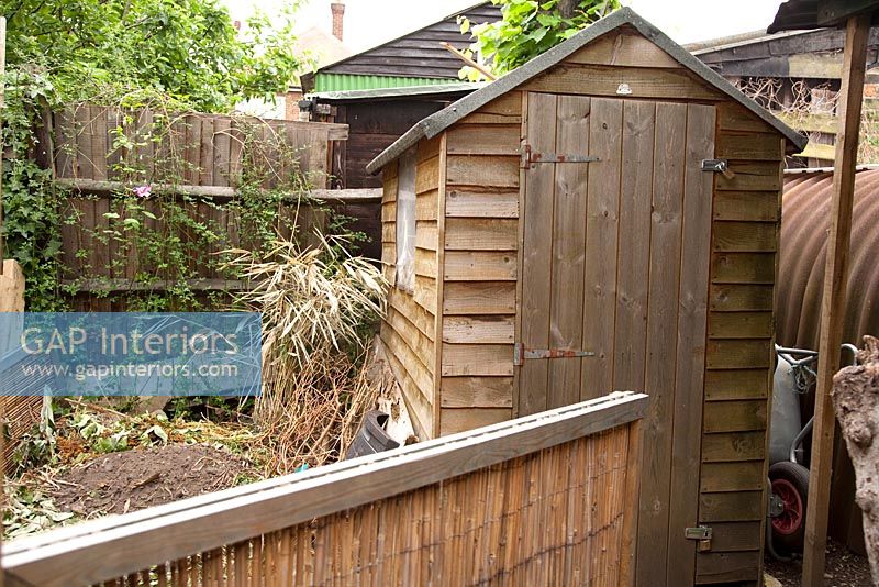 Wooden shed in garden 