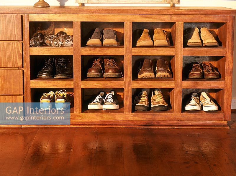Collection of shoes on shelf