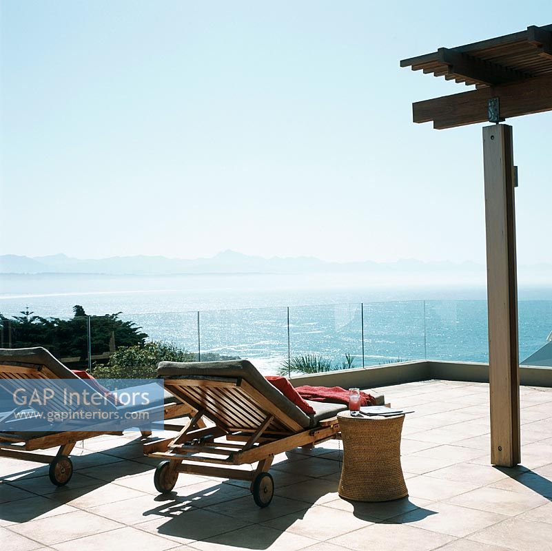 Sun loungers on sea view terrace