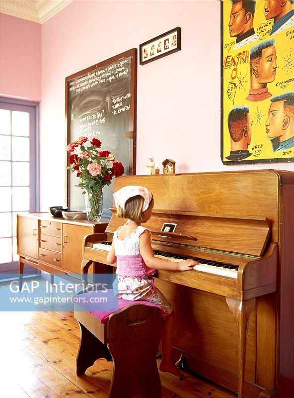 A little girl playing the piano