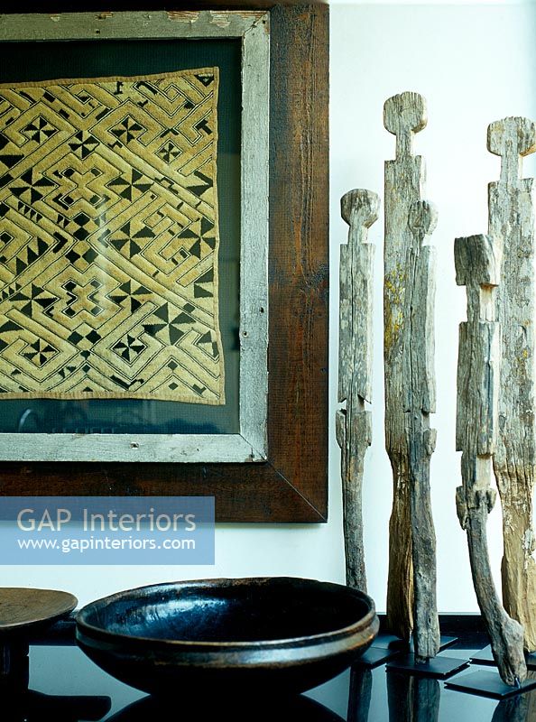 Detail of wooden sculptures on table