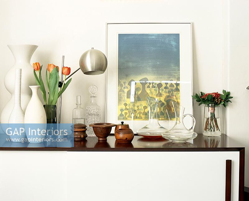 Collection of vases and jugs on sideboard