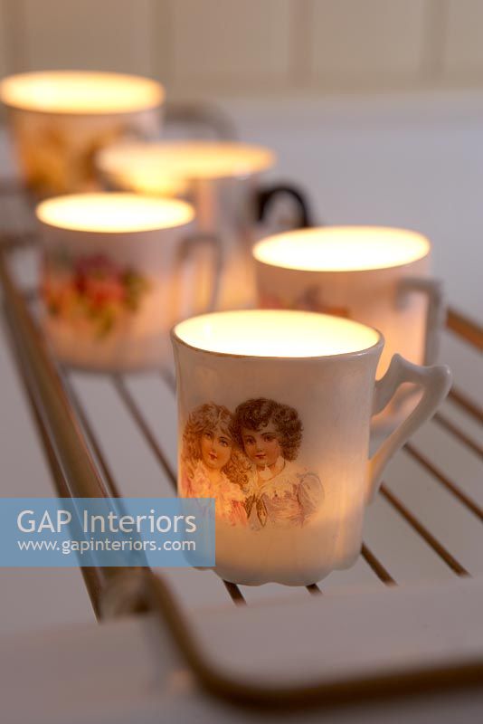 Candles in classic tea cups