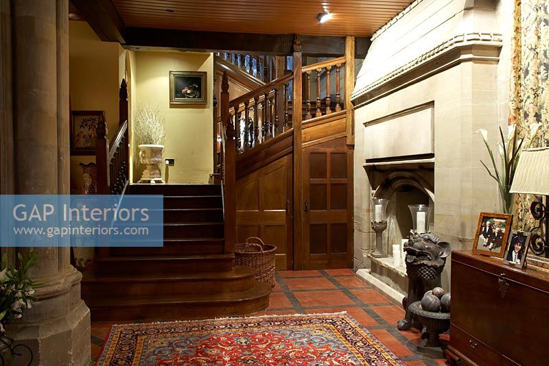 Entrance hall with stone fireplace