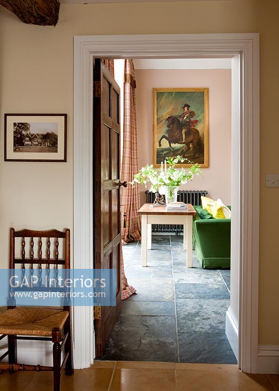 Country hallway with doorway to living room