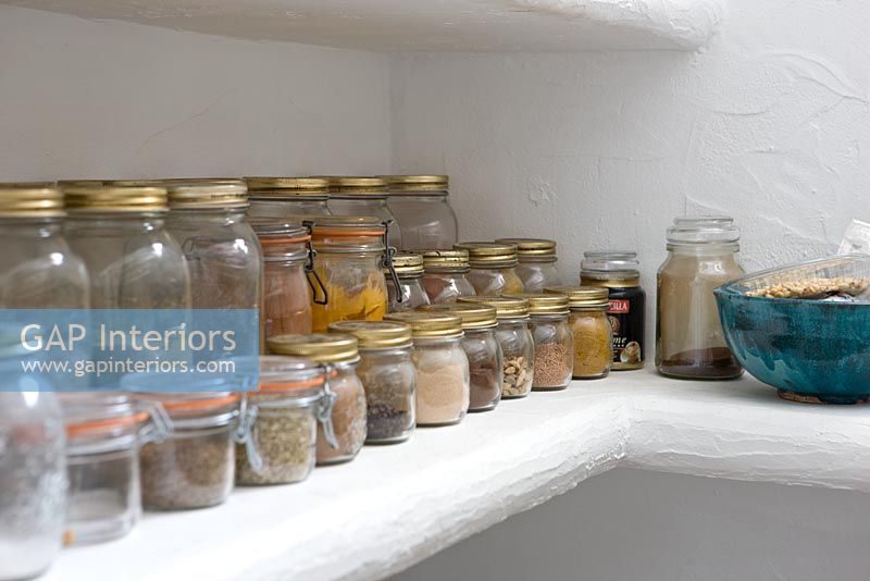 Storage jars on pantry shelf