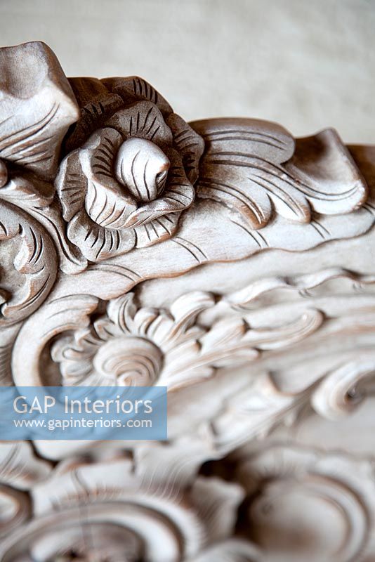 Close up of ornate carved armchair 