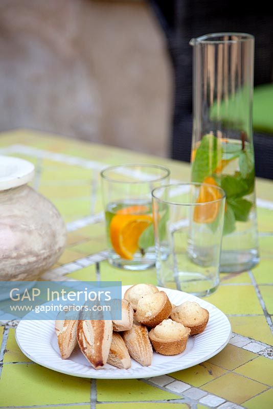 Food and accessories on outdoor dining table