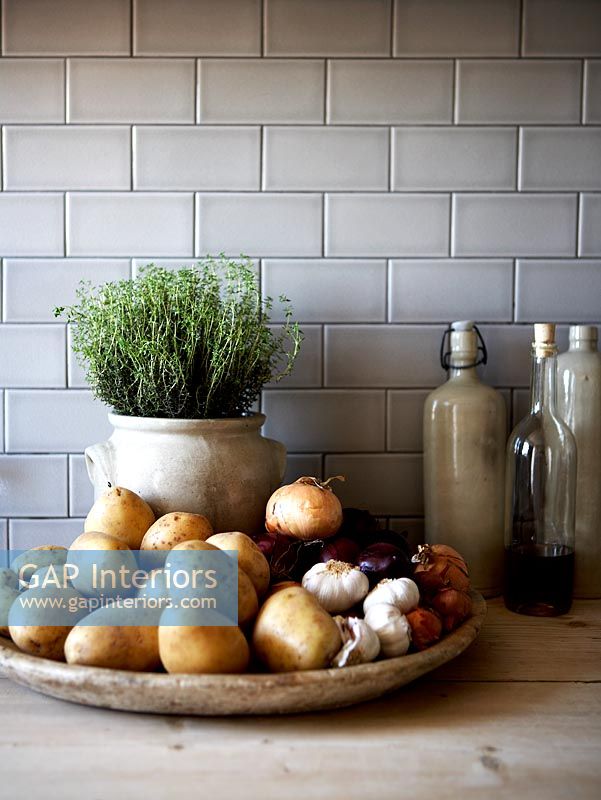 Food and accessories on kitchen worktop