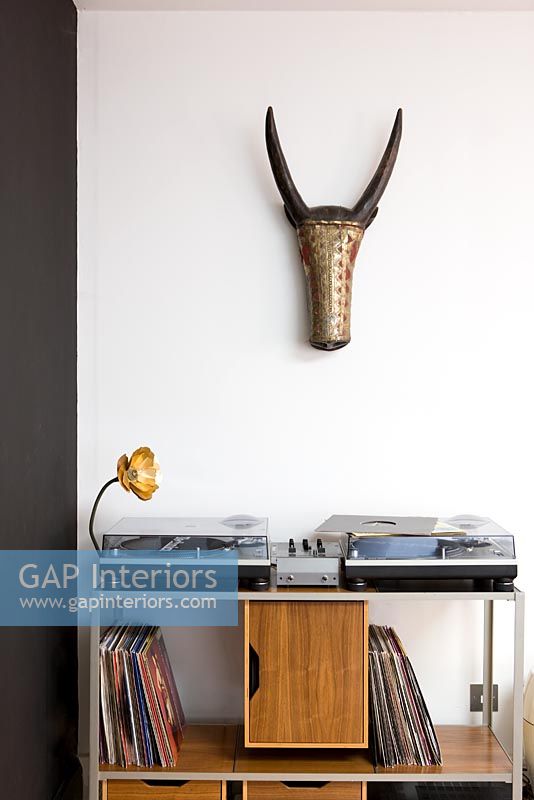 Decks and record storage under wall mounted antelope head