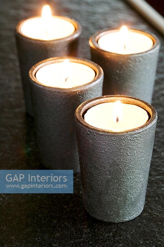 Candles in grey holders