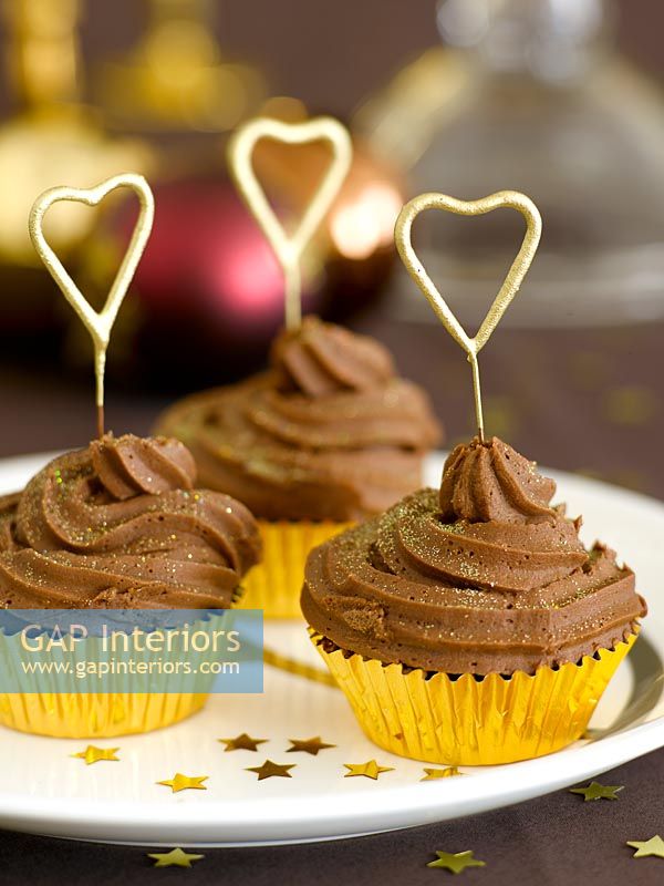 Cup cakes with heart decorations