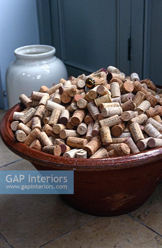 Old corks in earthenware bowl