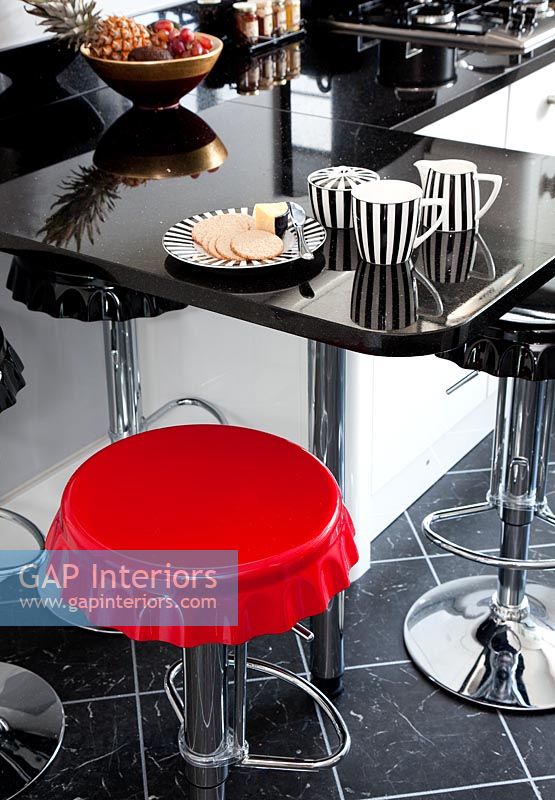 Red stool in kitchen
