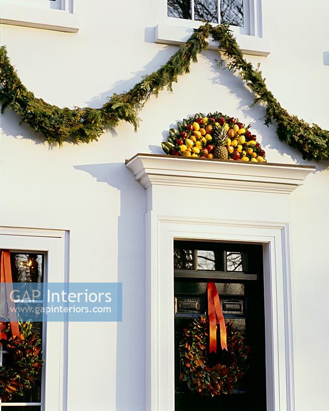 Classic house exterior decorated for Christmas