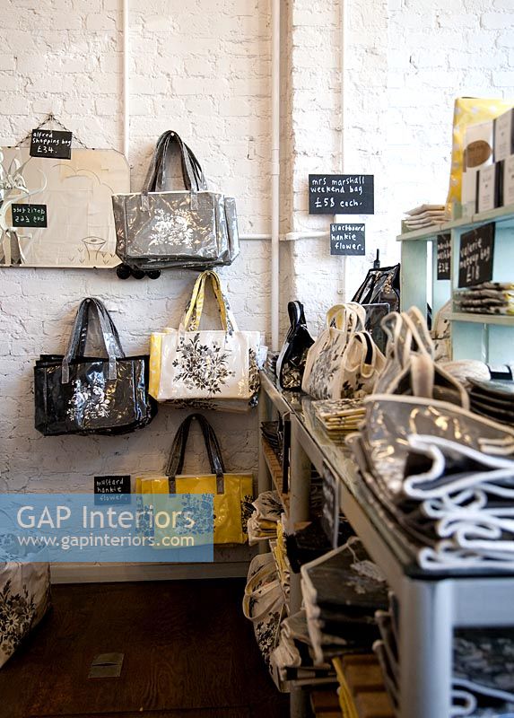 Bags and accessories on display in shop 