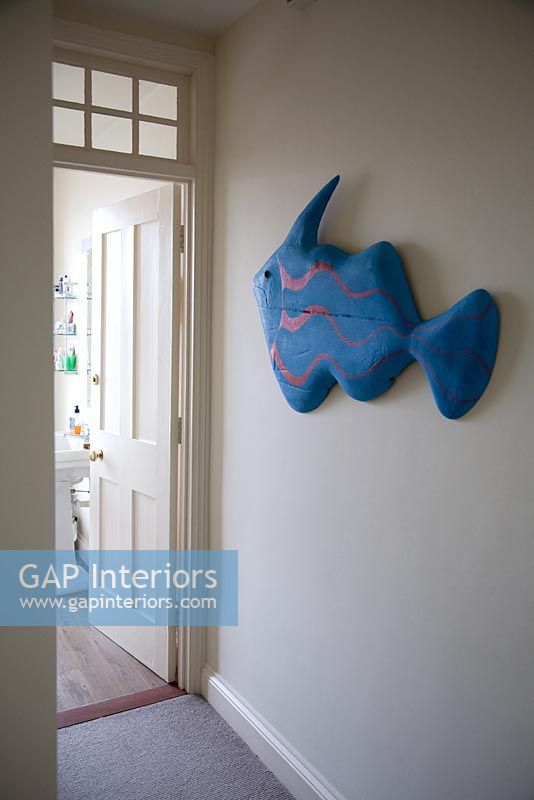 Wooden fish on wall 