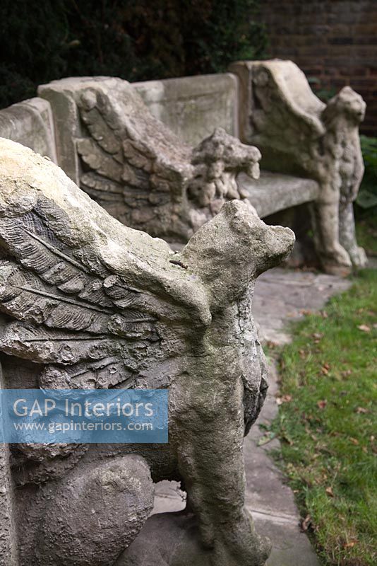 Detail of classic stone garden chairs 