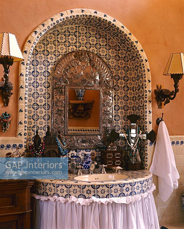 Decoratively tiled bathroom sink and surround