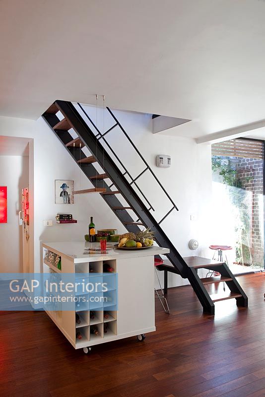 Staircase from contemporary kitchen