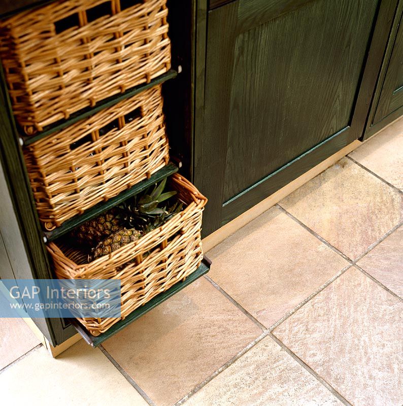 Detail of basket drawers in classic kitchen 