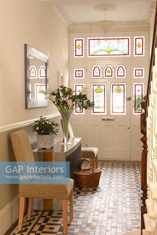 Classic hallway with patterned tiled floor 