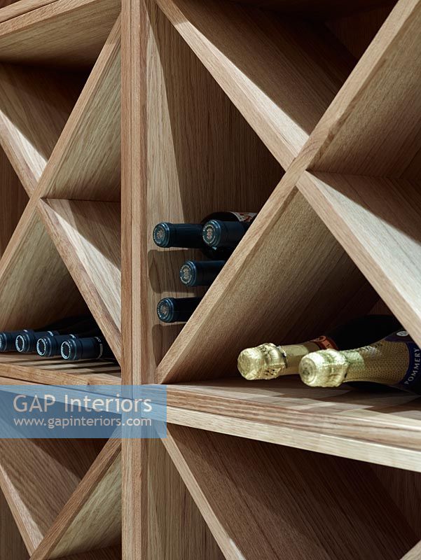 Detail of wine in wooden rack