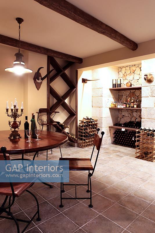 Classic wine cellar with table and chairs 