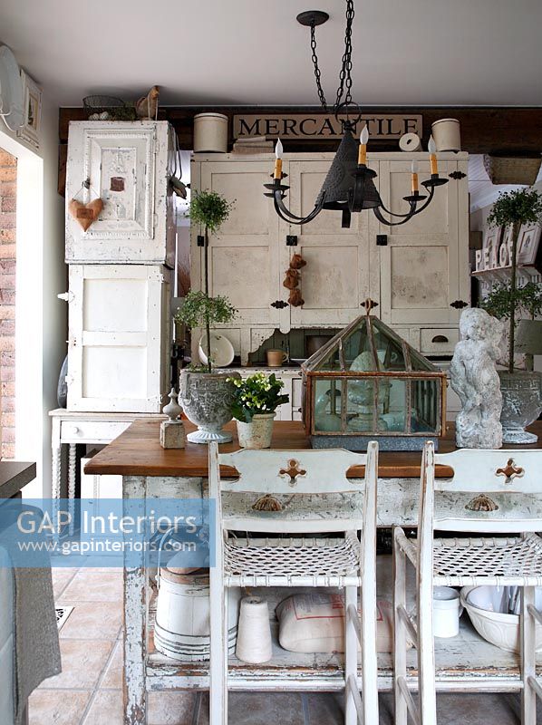 Country kitchen with distressed furniture 