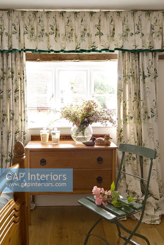 Curtains in country bedroom