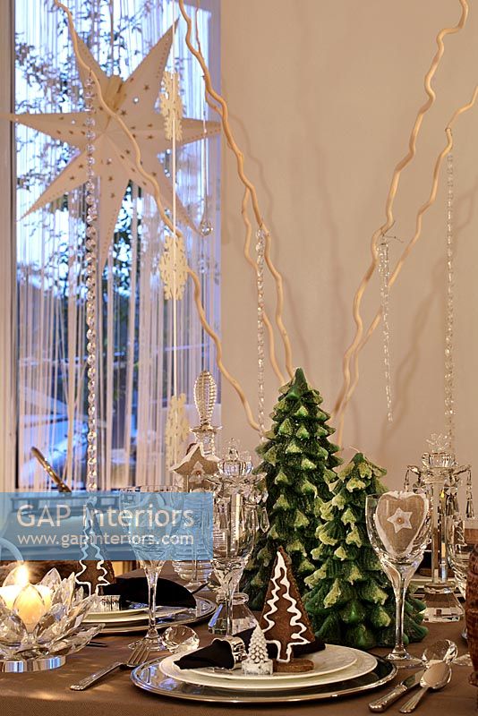 Modern dining table decorated for Christmas meal