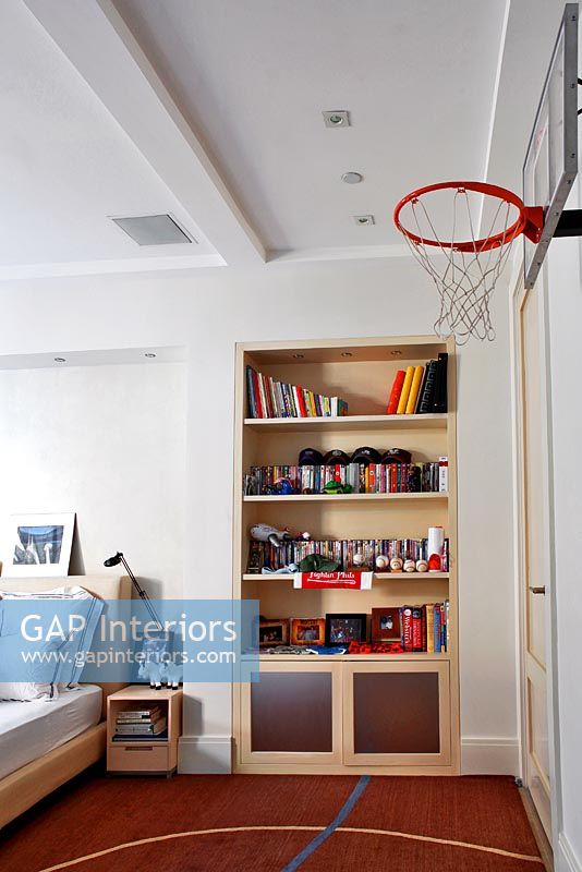 Boy's bedroom with basketball net