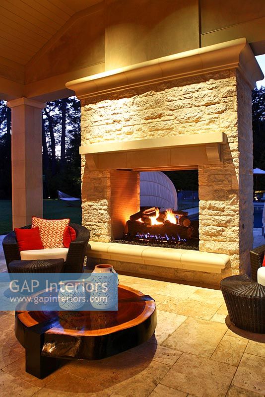 Villa patio with exterior fireplace