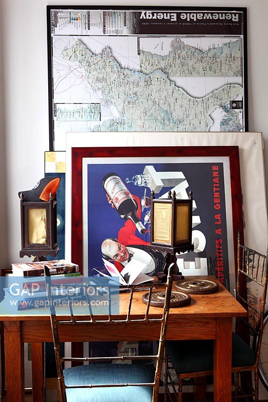 Wooden desk and vintage posters