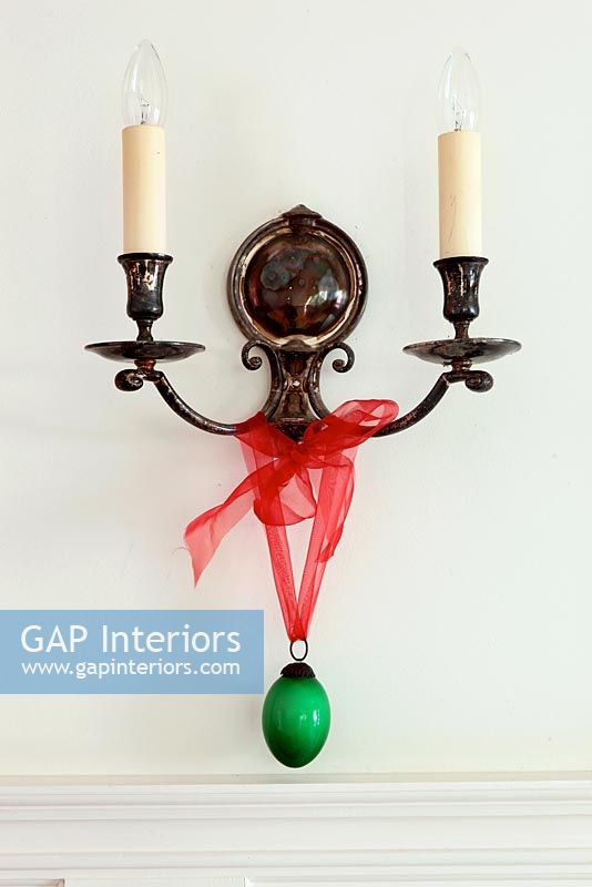 Vintage sconce with ornament