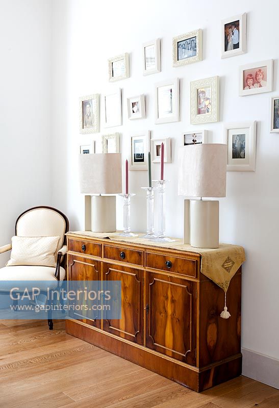 Wooden sideboard and photos display