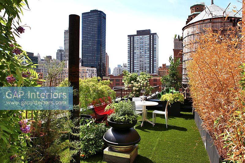 Modern roof terrace with fake grass