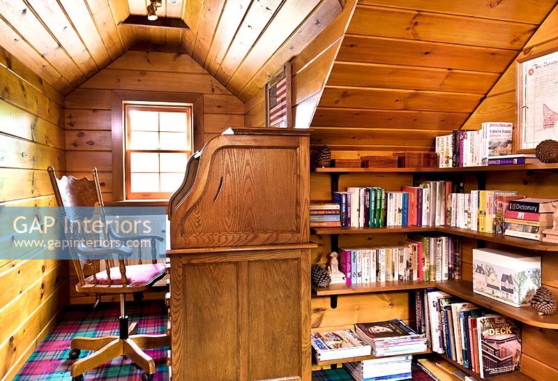 Wooden study with built in shelving