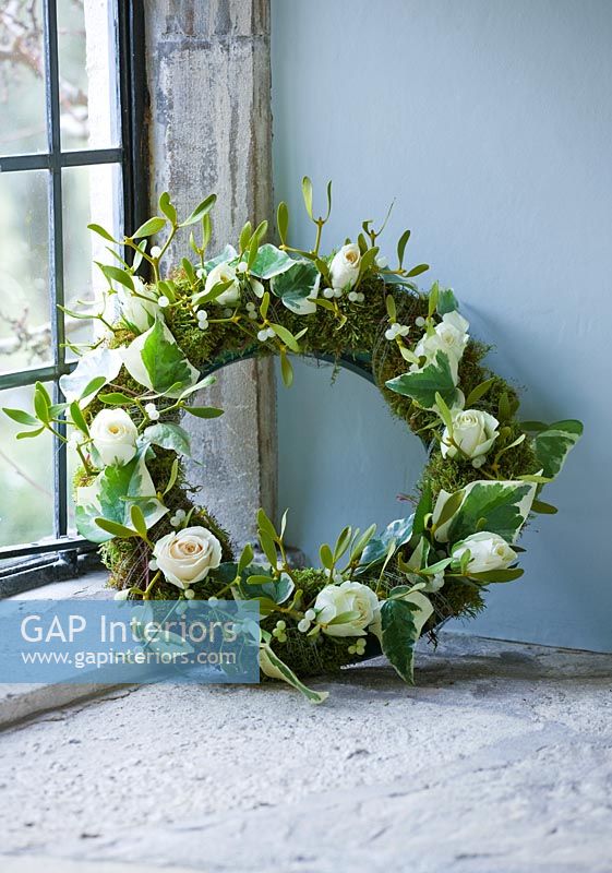 Christmas wreath of Mistletoe, Ivy and Roses