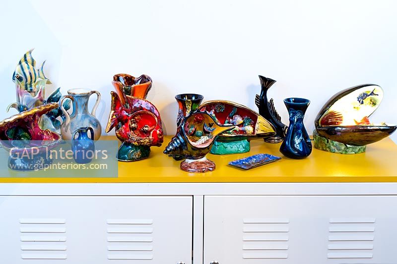 Colourful ceramics on Ikea cabinet