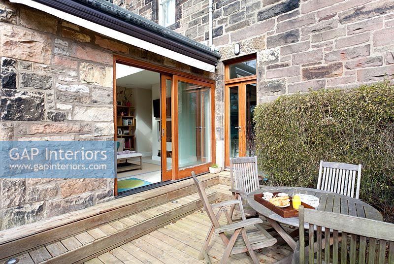 Modern extension on stone cottage