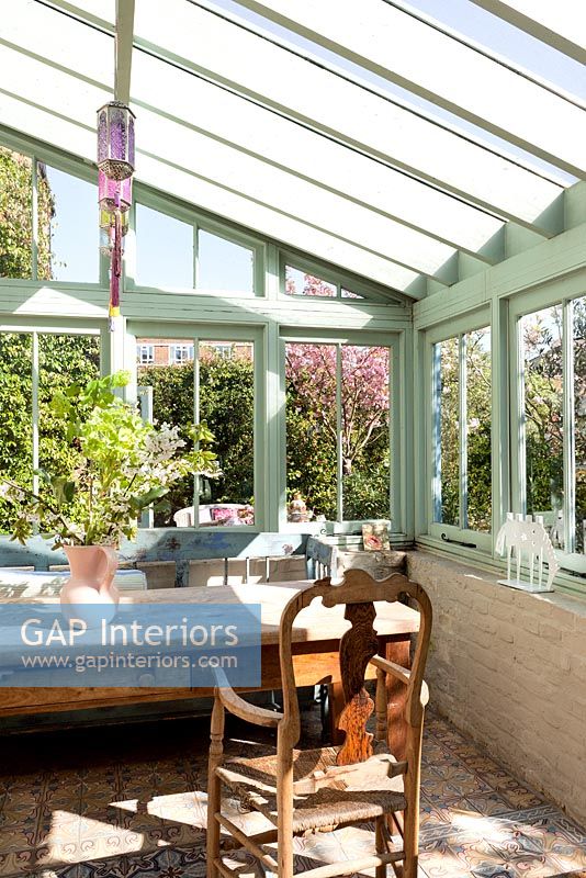 Conservatory with vintage furniture 