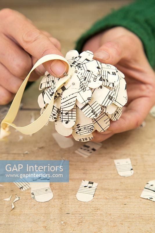Step by Step guide for making paper cones using music sheet paper - Attaching ribbon