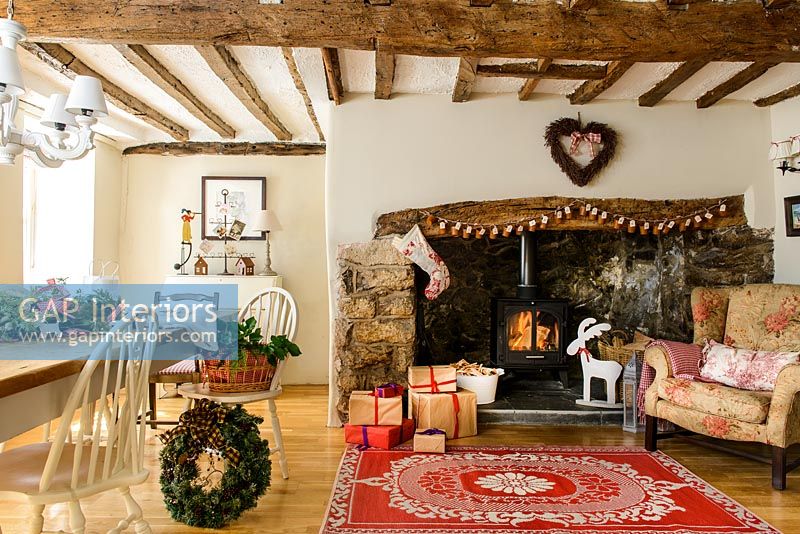 Country living and dining room decorated for christmas