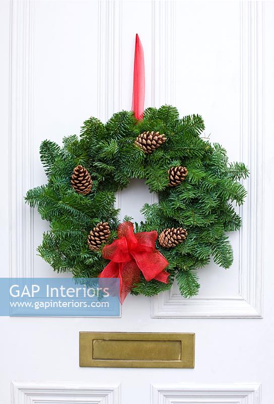 Christmas wreath with conifer foliage and pine cones